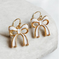 Gold & White Bow Charm Earrings